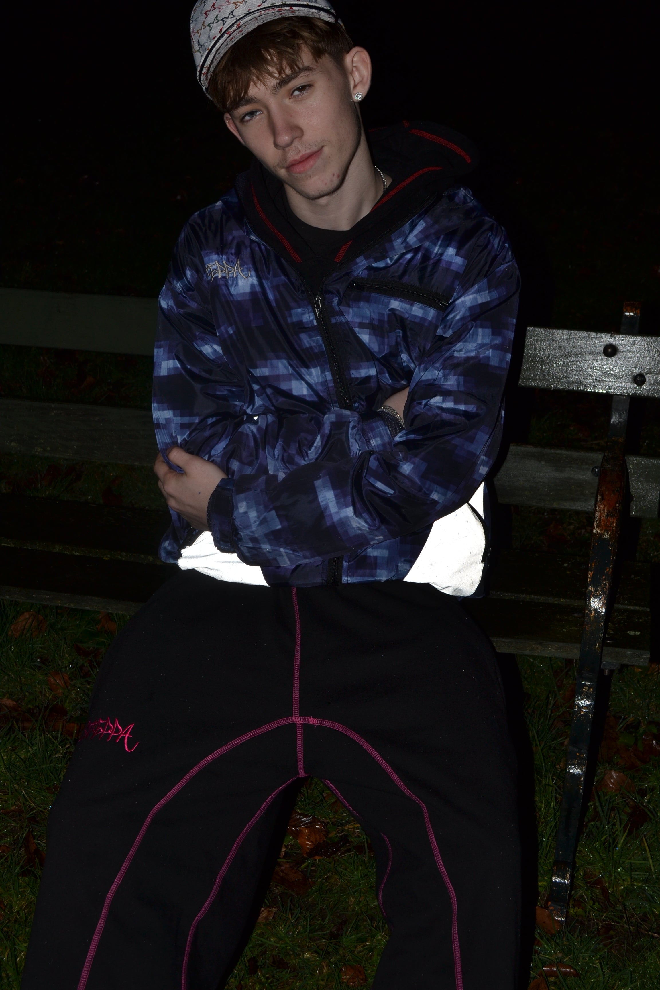 "GLITCHED" WINDBREAKER