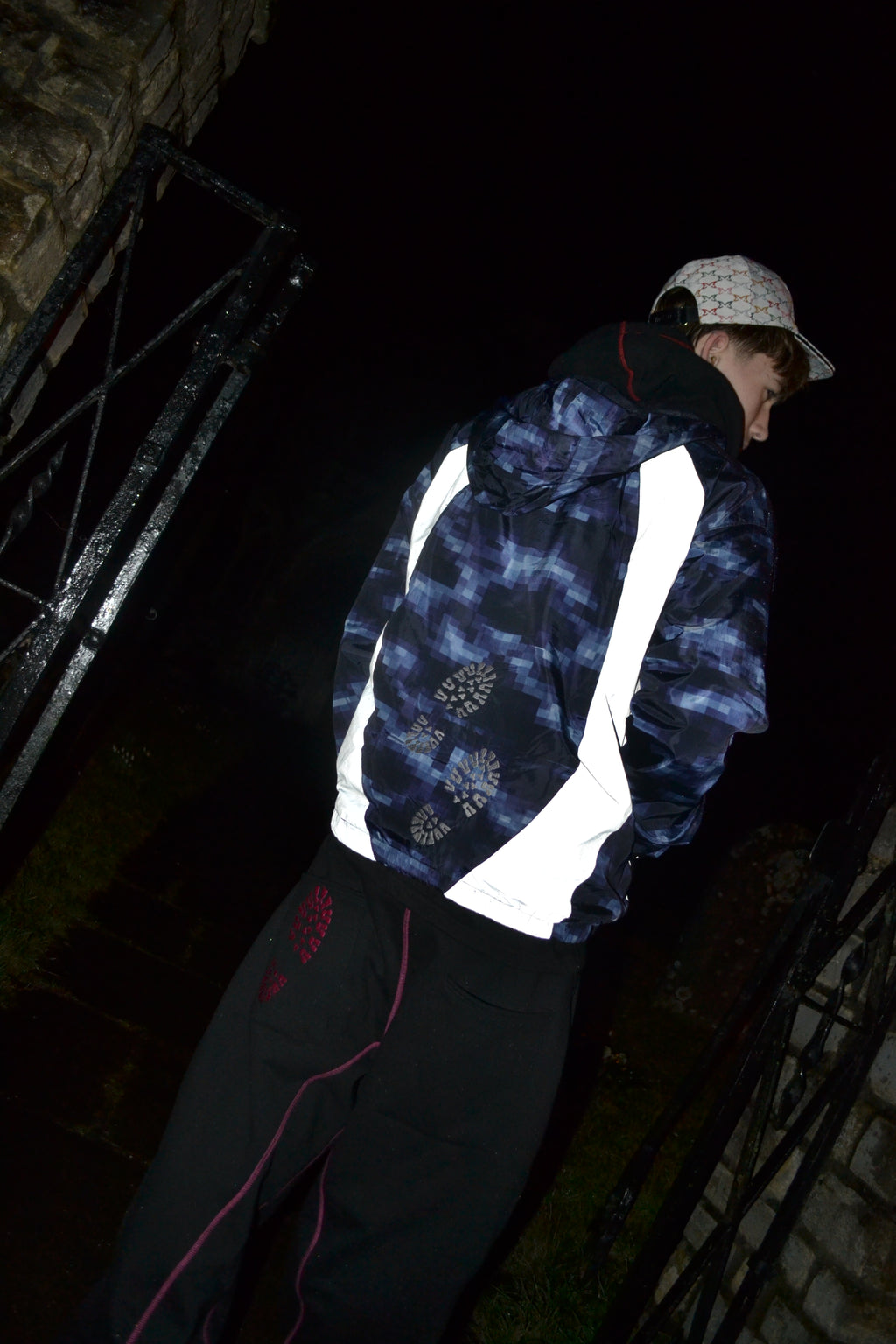"GLITCHED" WINDBREAKER