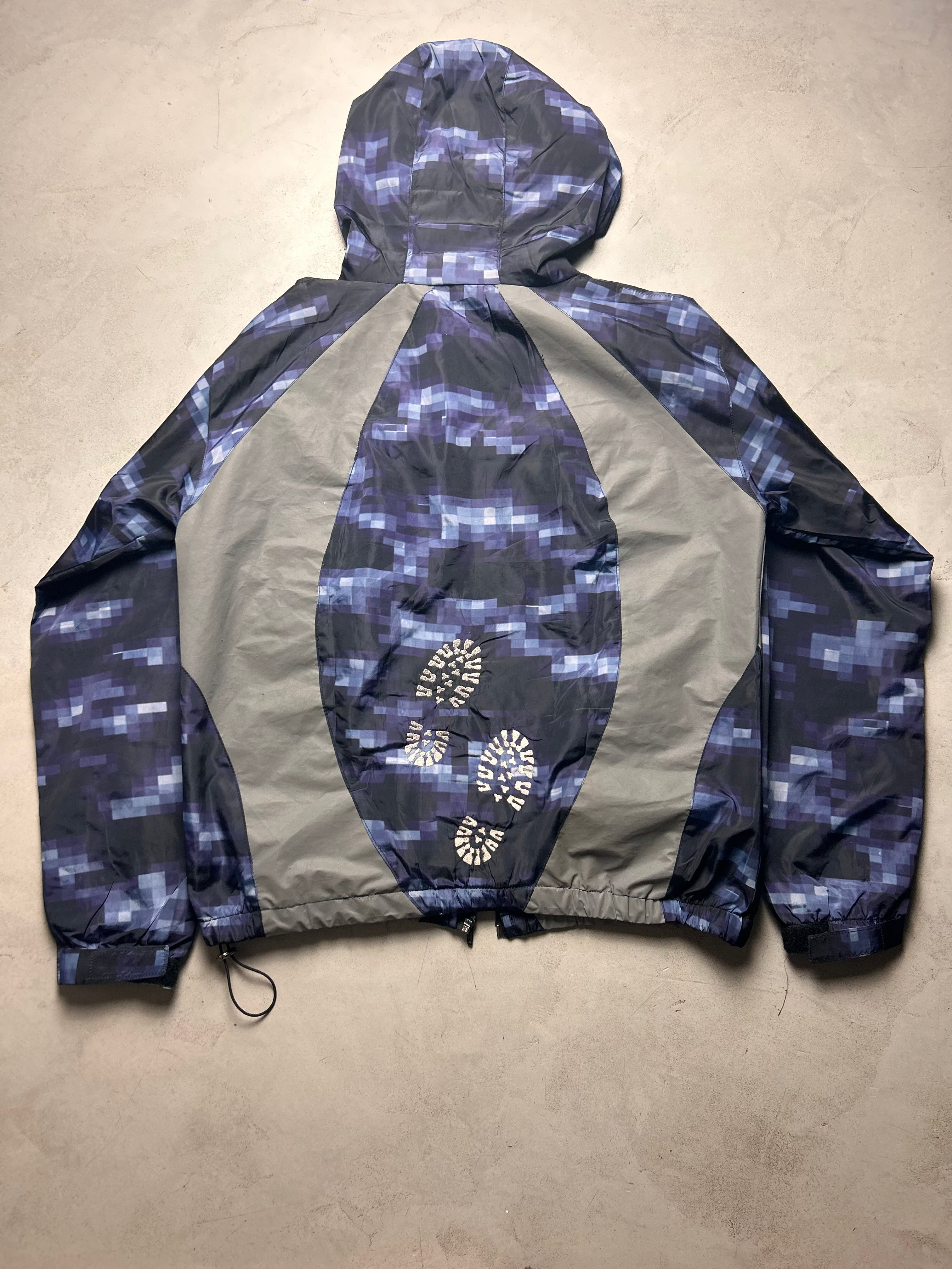 "GLITCHED" WINDBREAKER